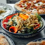 A vibrant spread of Mexican and Italian dishes, perfect for a delicious meal.